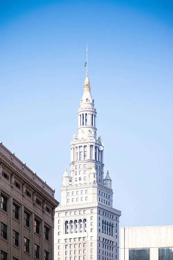 A tall stone tower against a clear sky